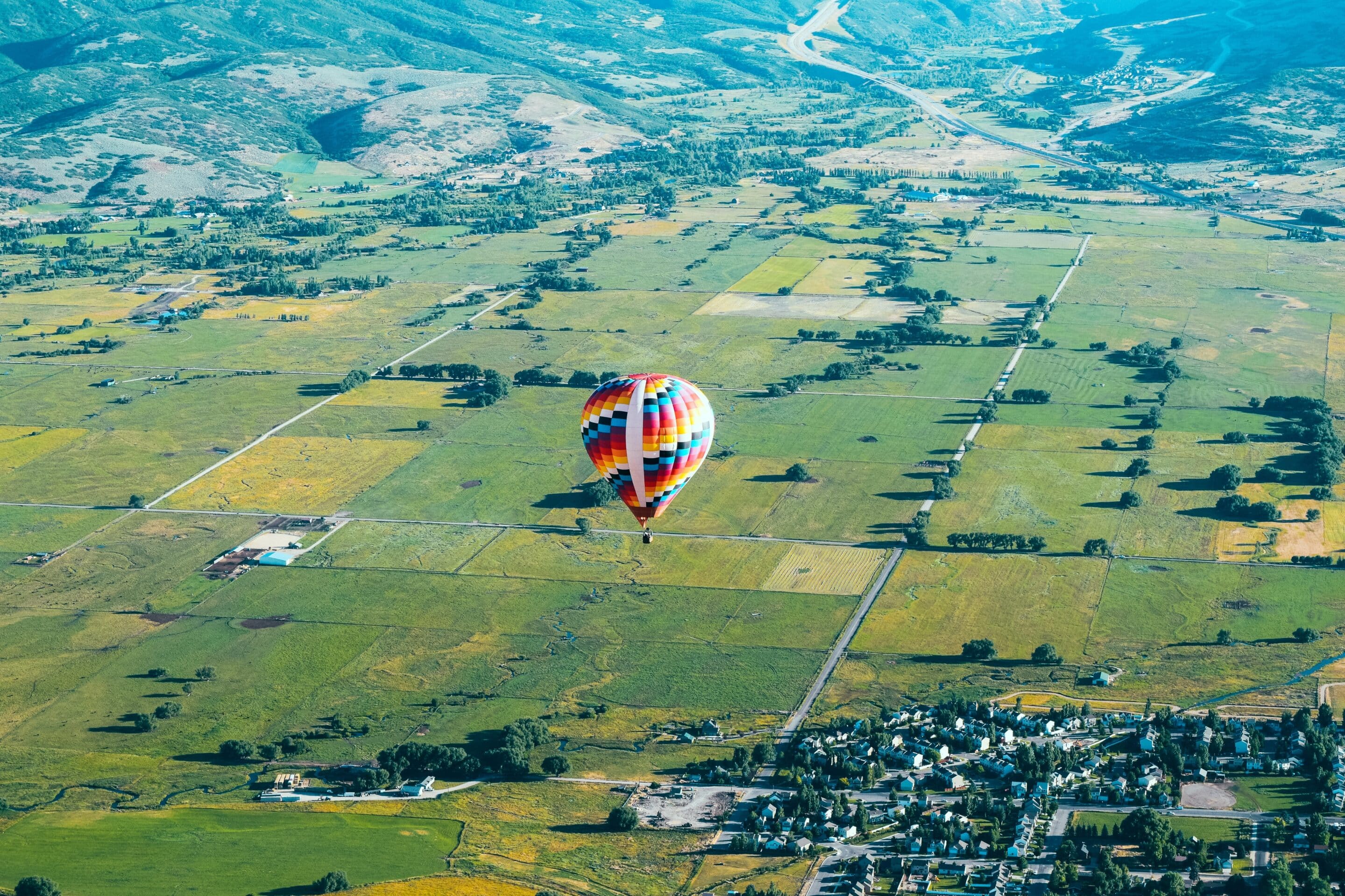 Aerial,Photo,Of,A,Beautiful,,Colorful,Hot,Air,Balloon,,Flying